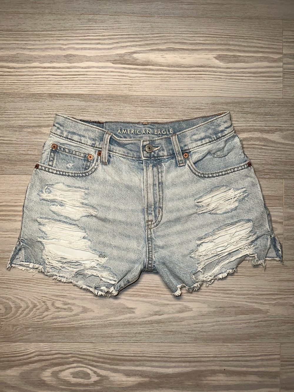 American Eagle Outfitters
Light Blue Distressed Denim Shorts - Size 2 - Picture 2 of 12